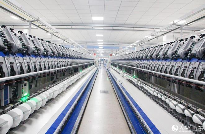 机器人接线落纱智慧纺纱生产忙(图1)